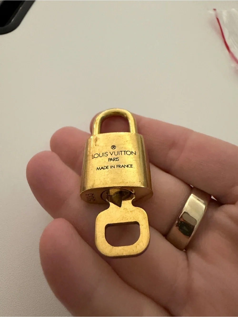 Louis Vuitton Gold Lock & Key #303